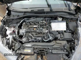 2022 Toyota Corolla Cross LE z VIN 7MUCAAAG9NV024206, wystawiony jako Copart lot #53733855 z przebiegiem 5610 mil mil oraz Szkody całkowita. Historia ofert i sprzedaży dostępna na DreamBid. Obrazek 11.