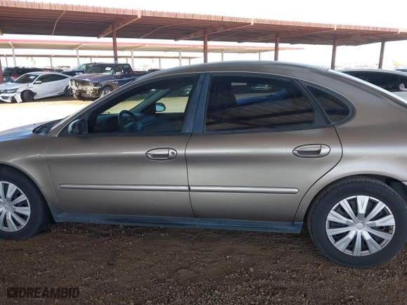 2002 Ford Taurus LX with VIN 1FAFP52U72G284116, listed as a IAAI auction lot 42004075 with 86,544 mi miles. Bid and sale history available at carsss.com. Image 14.