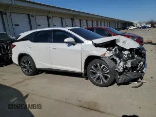 2020 Lexus RX 350L with VIN JTJHZKFA7L2025617, listed as a Copart auction lot 47249415 with 86,045 mi miles and Salvage title. Bid and sale history available at DreamBid. Image 4.