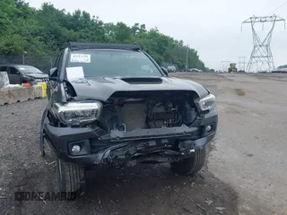 2017 Toyota Tacoma SR5 with VIN 3TMCZ5ANXHM089093, listed as a IAAI auction lot 42513711 with 86,022 mi miles and . Bid and sale history available at DreamBid. Image 6.