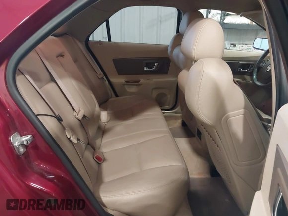 2006 Cadillac CTS with VIN 1G6DM57T560167128, listed as a IAAI auction lot 41911884 with 129,678 mi miles. Bid and sale history available at carsss.com. Image 8.
