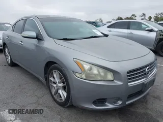 2009 Nissan Maxima S z VIN 1N4AA51E49C831446, wystawiony jako IAAI lot #42160533 z przebiegiem 154 370 mil mil oraz . Historia ofert i sprzedaży dostępna na DreamBid. Obrazek 1.