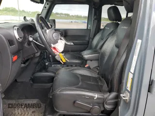 2014 Jeep Wrangler Unlimited Rubicon z VIN 1C4HJWFG0EL316513, wystawiony jako Copart lot #57182325 z przebiegiem 150 012 mil mil oraz Szkoda całkowita • Salvage title. Historia ofert i sprzedaży dostępna na DreamBid. Obrazek 7.