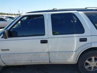 2000 Oldsmobile Bravada z VIN 1GHDT13WXY2284231, wystawiony jako IAAI lot #41751228 z przebiegiem 151 477 mil mil oraz . Historia ofert i sprzedaży dostępna na DreamBid. Obrazek 14.