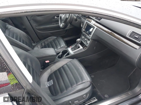 2014 Volkswagen CC Lux with VIN WVWRP7AN6EE520381, listed as a IAAI auction lot 41338169 with 130,363 mi miles. Bid and sale history available at carsss.com. Image 5.