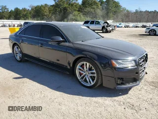 2016 Audi A8 L 4.0T Sport with VIN WAU43AFD2GN005588, listed as a Copart auction lot 76934794 with 133,813 mi miles and Salvage Title. Bid and sale history available at carsss.com. Image 4.