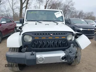 2014 Jeep Wrangler Unlimited Sahara with VIN 1C4BJWEGXEL326585, listed as a IAAI auction lot 41712047 with 155,973 mi miles. Bid and sale history available at carsss.com. Image 12.