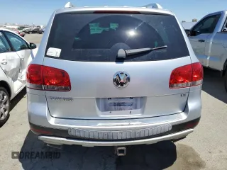 2004 Volkswagen Touareg z VIN WVGCM77L74D059969, wystawiony jako Copart lot #68238193 z przebiegiem Nie podano mil oraz Szkody całkowita. Historia ofert i sprzedaży dostępna na DreamBid. Obrazek 6.