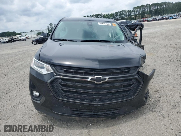 2021 Chevrolet Traverse Premier with VIN 1GNERKKW2MJ262862, listed as a Copart auction lot 58779765 with 76,927 mi miles and Salvage title. Bid and sale history available at DreamBid. Image 5.