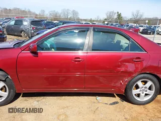 2002 Toyota Camry XLE z VIN 4T1BF32K02U006928, wystawiony jako IAAI lot #41569825 z przebiegiem 188 482 mil mil oraz . Historia ofert i sprzedaży dostępna na DreamBid. Obrazek 13.