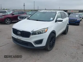 2016 Kia Sorento LX with VIN 5XYPG4A37GG055639, listed as a IAAI auction lot 41888968 with 140,431 mi miles. Bid and sale history available at carsss.com. Image 2.