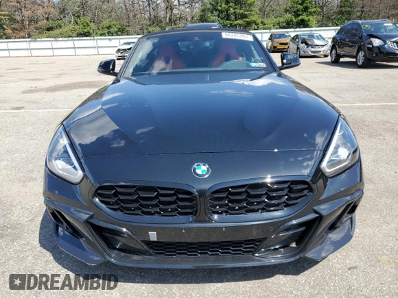2024 BMW Z4 sDrive30i with VIN WBAHF3C09RWY35844, listed as a Copart auction lot 68285784 with 4,577 mi miles and Salvage Title. Bid and sale history available at carsss.com. Image 5.