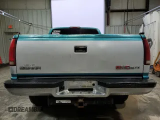 1995 GMC Sierra 1500 z VIN 2GTEK19K5S1509969, wystawiony jako Copart lot #42945545 z przebiegiem 361 334 mil mil oraz Szkody całkowita. Historia ofert i sprzedaży dostępna na DreamBid. Obrazek 6.