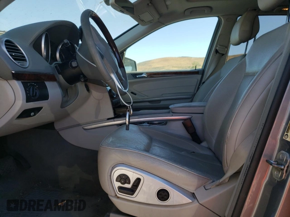 2011 Mercedes-Benz GL-Class GL 450 with VIN 4JGBF7BE5BA634180, listed as a Copart auction lot 69034074 with 219,553 mi miles and Salvage Title. Bid and sale history available at carsss.com. Image 7.
