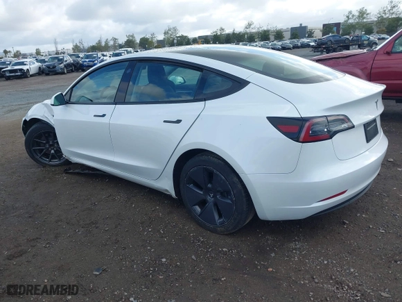 2023 Tesla Model 3 with VIN 5YJ3E1EA4PF405361, listed as a IAAI auction lot 41932723 with 28,487 mi miles. Bid and sale history available at carsss.com. Image 3.