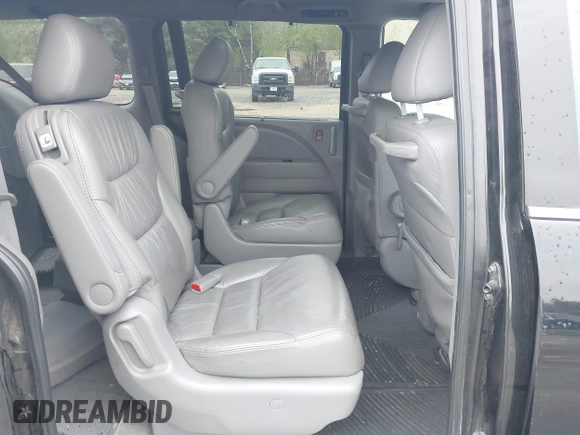 2010 Honda Odyssey Touring with VIN 5FNRL3H97AB056975, listed as a IAAI auction lot 42169269 with 183,483 mi miles. Bid and sale history available at carsss.com. Image 8.
