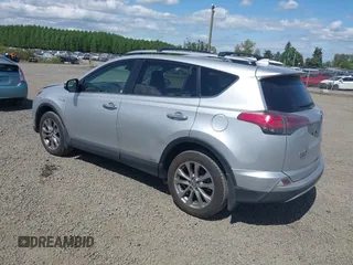 2016 Toyota RAV4 Limited with VIN JTMDJREVXGD030438, listed as a IAAI auction lot 42189476 with 106,366 mi miles and . Bid and sale history available at DreamBid. Image 3.