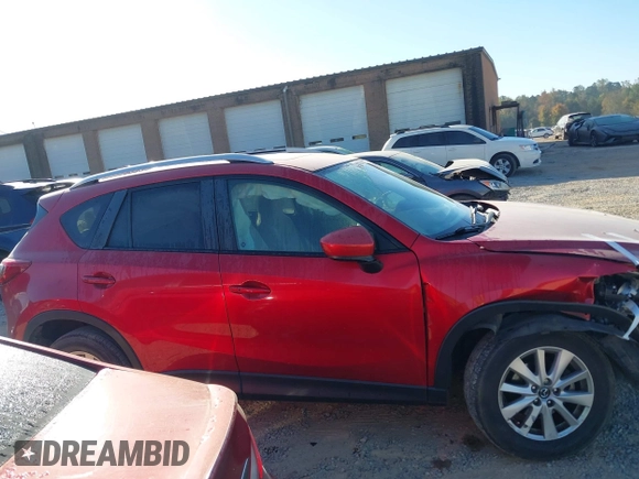 2015 Mazda CX-5 Touring with VIN JM3KE4CY6F0455468, listed as a IAAI auction lot 40669780 with 225,831 mi miles and . Bid and sale history available at carsss.com. Image 14.
