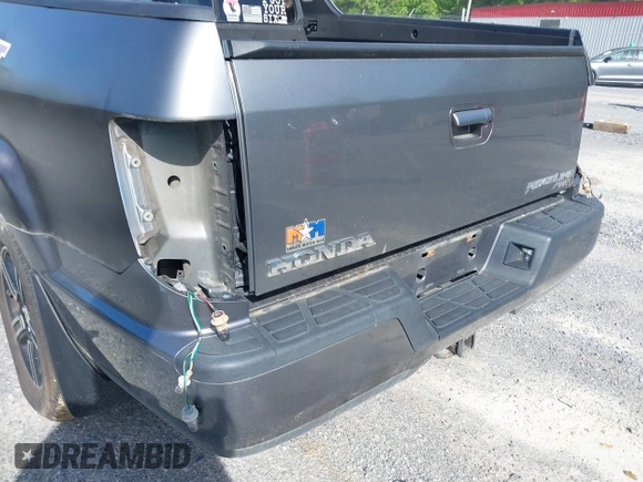 2009 Honda Ridgeline RTL with VIN 2HJYK16539H503533, listed as a IAAI auction lot 42307300 with 206,102 mi miles and . Bid and sale history available at DreamBid. Image 6.