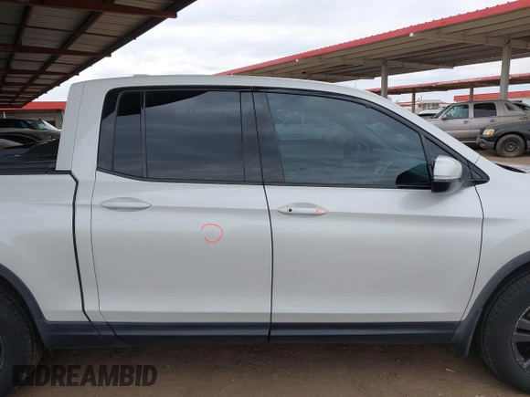 2019 Honda Ridgeline Sport with VIN 5FPYK3F10KB044218, listed as a IAAI auction lot 41907044 with 151,887 mi miles and . Bid and sale history available at DreamBid. Image 12.