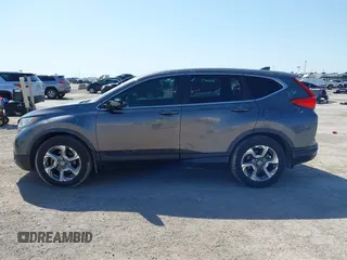 2019 Honda CR-V EX with VIN 5J6RW1H58KA042502, listed as a IAAI auction lot 42001700 with 117,396 mi miles and . Bid and sale history available at DreamBid. Image 14.