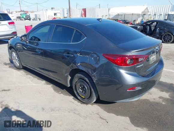 2016 Mazda Mazda3 i Grand Touring with VIN JM1BM1X79G1278079, listed as a IAAI auction lot 42010729 with 104,797 mi miles. Bid and sale history available at carsss.com. Image 3.