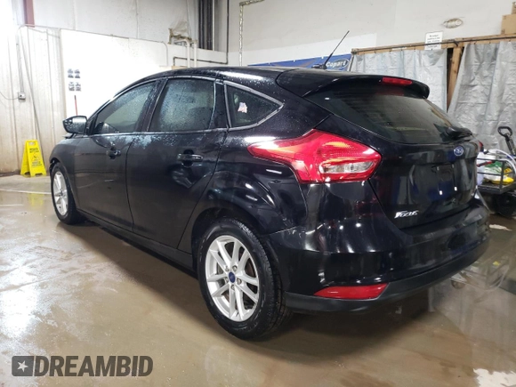 2017 Ford Focus SE with VIN 1FADP3K23HL243007, listed as a Copart auction lot 51693145 with 121,849 mi miles and Salvage Title. Bid and sale history available at carsss.com. Image 2.