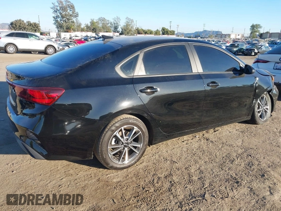 2023 Kia Forte LXS with VIN 3KPF24AD7PE680915, listed as a IAAI auction lot 40741003 with 16,770 mi miles and . Bid and sale history available at DreamBid. Image 4.