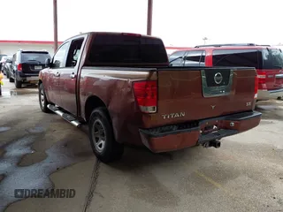 2004 Nissan Titan LE with VIN 1N6AA07A14N502098, listed as a IAAI auction lot 42130328 with 237,815 mi miles and . Bid and sale history available at DreamBid. Image 3.