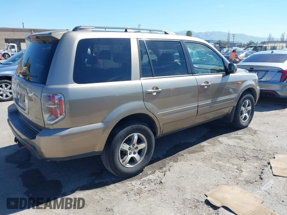 2008 Honda Pilot EX-L with VIN 5FNYF18758B012974, listed as a IAAI auction lot 41884153 with 112,165 mi miles and . Bid and sale history available at DreamBid. Image 4.