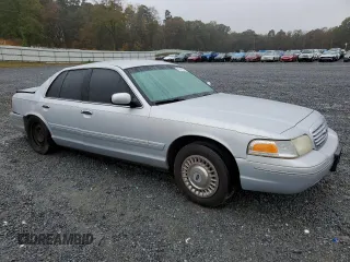 1999 Ford Crown Victoria Police with VIN 2FAFP71W8XX237354, listed as a Copart auction lot 79340304 with 198,482 mi miles and Salvage Title. Bid and sale history available at carsss.com. Image 4.