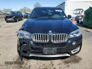 2018 BMW X5 xDrive35i with VIN 5UXKR0C5XJ0X97623, listed as a Copart auction lot 52014265 with 87,122 mi miles and Salvage Title. Bid and sale history available at carsss.com. Image 5.
