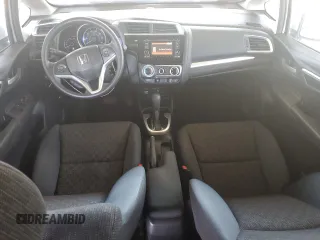 2016 Honda Fit LX with VIN JHMGK5H58GX031938, listed as a Copart auction lot 63101705 with 102,138 mi miles and Salvage title. Bid and sale history available at DreamBid. Image 8.