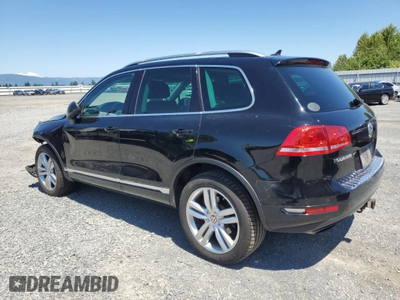 2013 Volkswagen Touareg Lux with VIN WVGEF9BP0DD001565, listed as a Copart auction lot 63070845 with 123,788 mi miles and Salvage title. Bid and sale history available at DreamBid. Image 2.