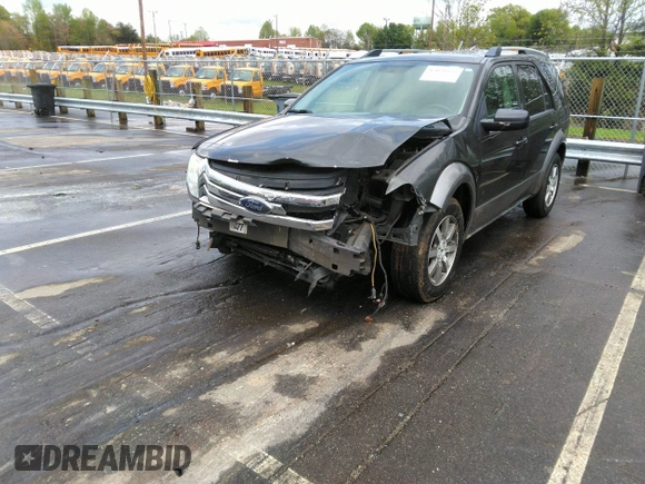 2008 Ford Taurus X SEL z VIN 1FMDK02W08GA28649, wystawiony jako IAAI lot #42026925 z przebiegiem 191 857 mil mil oraz . Historia ofert i sprzedaży dostępna na DreamBid. Obrazek 18.