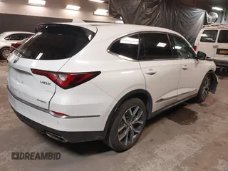 2023 Acura MDX w/Technology Package with VIN 5J8YE1H40PL041191, listed as a IAAI auction lot 41390022 with 6,074 mi miles. Bid and sale history available at carsss.com. Image 4.