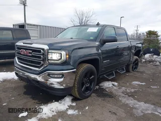 2017 GMC Sierra 1500 SLE with VIN 3GTU2MEC6HG319366, listed as a IAAI auction lot 41351311 with 123,097 mi miles and . Bid and sale history available at DreamBid. Image 17.