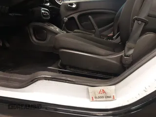 2016 Smart fortwo Passion z VIN WMEFJ5DA9GK061774, wystawiony jako IAAI lot #42005599 z przebiegiem 44 323 mil mil oraz . Historia ofert i sprzedaży dostępna na DreamBid. Obrazek 6.