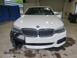 2018 BMW 5 Series 540i xDrive with VIN WBAJE7C53JWC54662, listed as a Copart auction lot 63703595 with 96,523 mi miles and Salvage title. Bid and sale history available at DreamBid. Image 5.