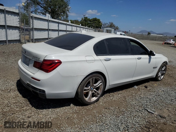 2014 BMW 7 Series 740Li with VIN WBAYE4C57ED137727, listed as a Copart auction lot 51847244 with 136,495 mi miles and Salvage Title. Bid and sale history available at carsss.com. Image 3.