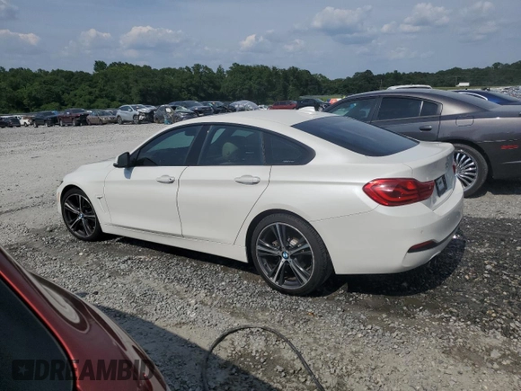 2018 BMW 4 Series 430i with VIN WBA4J1C57JBM10907, listed as a Copart auction lot 61549305 with 122,078 mi miles and Salvage title. Bid and sale history available at DreamBid. Image 2.