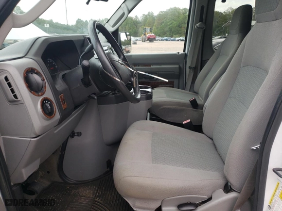 2014 Ford Econoline Wagon XL with VIN 1FBNE3BL0EDA92960, listed as a Copart auction lot 68583924 with 73,153 mi miles and Salvage Title. Bid and sale history available at carsss.com. Image 7.