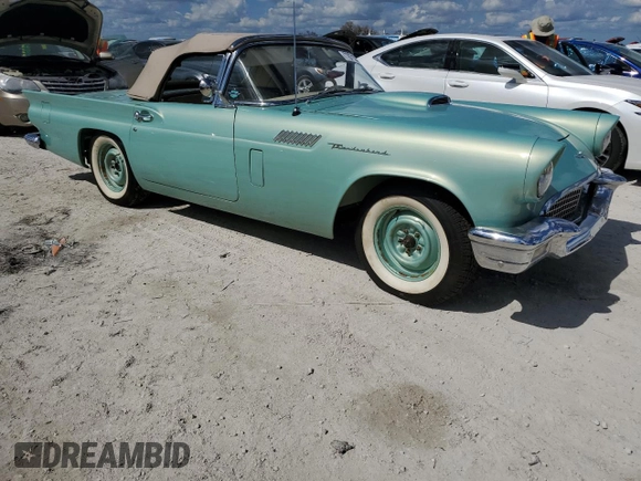 1957 Ford Thunderbird with VIN D7FH182410, listed as a Copart auction lot 77671374 with 319 mi miles and Salvage Title. Bid and sale history available at DreamBid. Image 4.