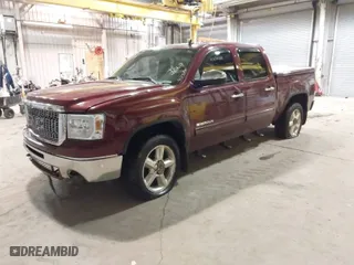 2013 GMC Sierra 1500 SLT with VIN 3GTP2WE70DG138799, listed as a IAAI auction lot 41555069 with 137,850 mi miles. Bid and sale history available at carsss.com. Image 2.