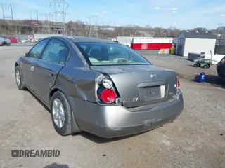 2002 Nissan Altima S with VIN 1N4AL11D92C256180, listed as a IAAI auction lot 41880101 with 112,228 mi miles. Bid and sale history available at carsss.com. Image 14.