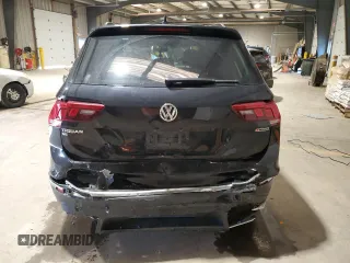 2021 Volkswagen Tiguan SE with VIN 3VV2B7AXXMM071024, listed as a Copart auction lot 52243675 with 31,448 mi miles and Salvage Title. Bid and sale history available at DreamBid. Image 6.