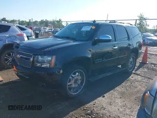 2008 Chevrolet Tahoe LTZ with VIN 1GNFK13018R259715, listed as a IAAI auction lot 42642469 with 208,452 mi miles and . Bid and sale history available at DreamBid. Image 2.
