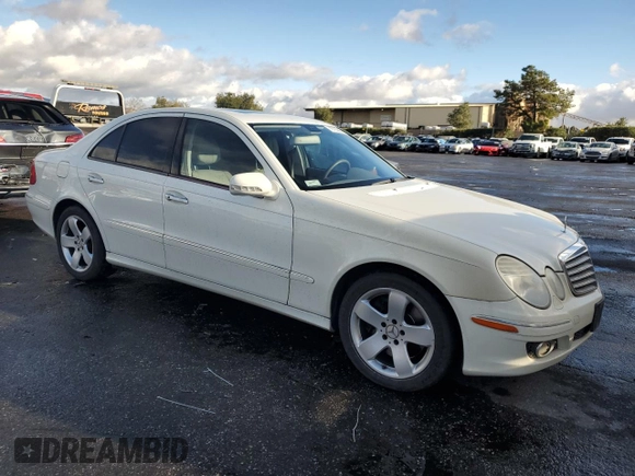 2007 Mercedes-Benz E 550 with VIN WDBUF90X77X212587, listed as a Copart auction lot 79753664 with 111,768 mi miles and Salvage Title. Bid and sale history available at carsss.com. Image 4.