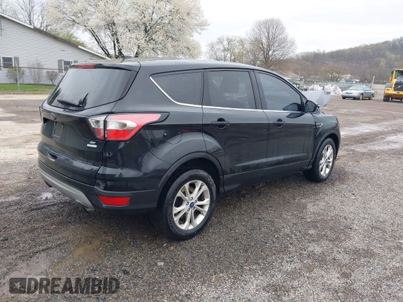 2017 Ford Escape SE with VIN 1FMCU0GD3HUC86839, listed as a IAAI auction lot 42017669 with 106,228 mi miles. Bid and sale history available at carsss.com. Image 4.