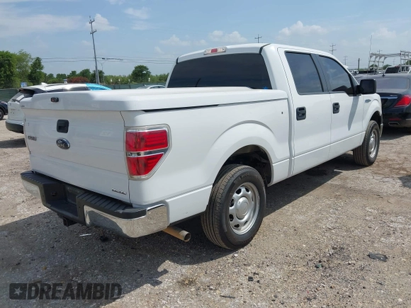 2014 Ford F-150 XL with VIN 1FTEW1CMXEKD40762, listed as a IAAI auction lot 42400704 with 75,769 mi miles and . Bid and sale history available at DreamBid. Image 4.